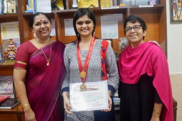 Felicitating Ms. Kushali Shah, Gold Medallist of Maharashtra University of Health Sciences, Nashik in first BASLP summer 2018